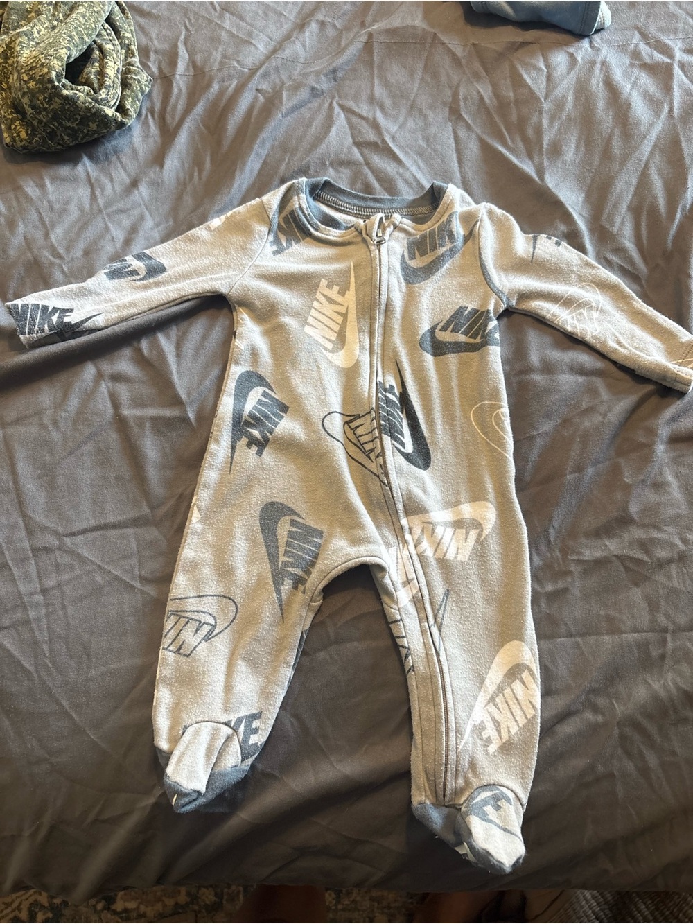 Set of two Nike baby footed one-piece zipper onesies